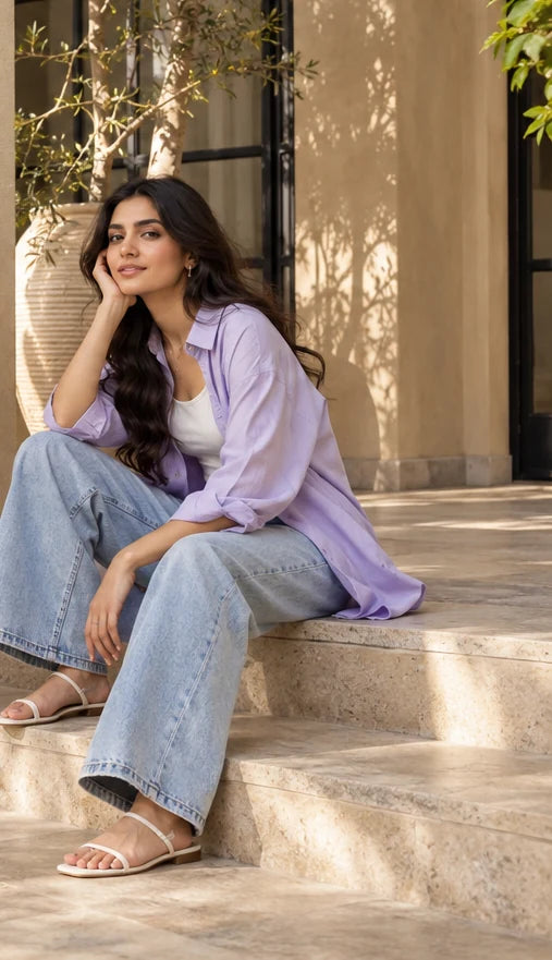 Lilac shirt styled with wide-leg denim